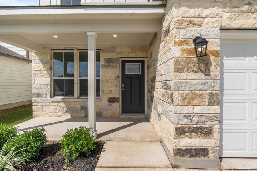 Exterior details and patio area of a home in The Meadows at Hunters Ranch, San Antonio (Image 3).