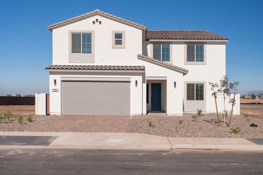 Front exterior of a new home in Terraza, San Tan Valley, AZ, highlighting curb appeal (Image 1). Front exterior of a new home in Terraza, San Tan Valley, AZ, highlighting curb appeal (Image 1).