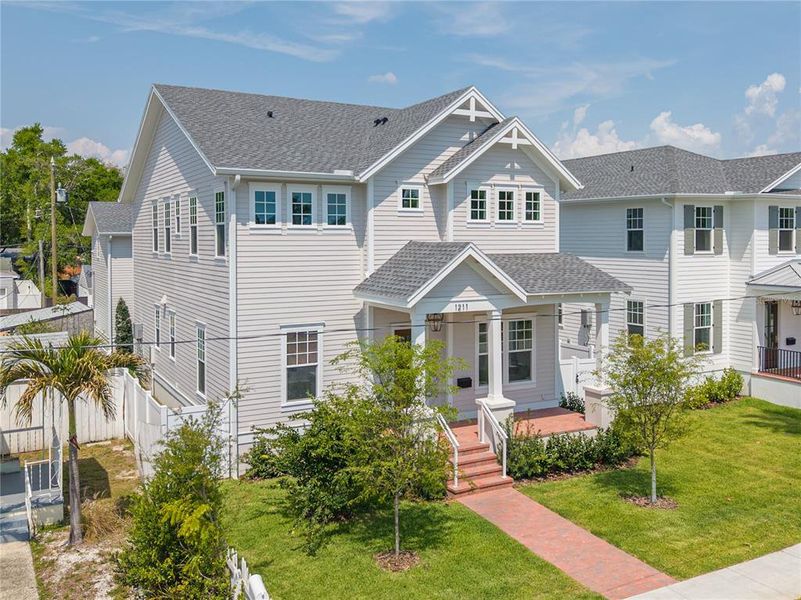 Front exterior of a new home in , St. Petersburg, FL, highlighting curb appeal (Image 22).