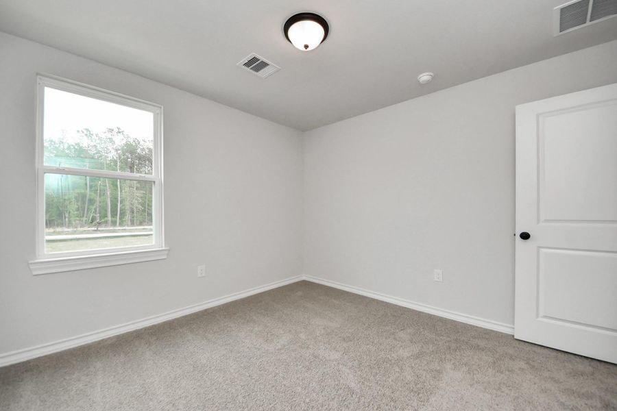 Spacious, unfurnished interior of a new home in The Enclave at Spring Branch, Conroe (Image 27). Spacious, unfurnished interior of a new home in The Enclave at Spring Branch, Conroe (Image 27).