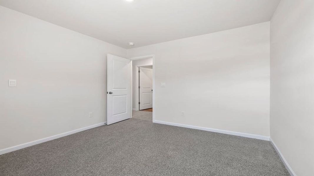 Spacious, unfurnished interior of a new home in Village Grove, Greenville (Image 26). Spacious, unfurnished interior of a new home in Village Grove, Greenville (Image 26).