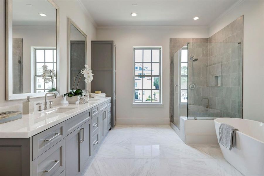 *Previous Model Home* Representative of a primary bath, featuring double sinks, walk-in shower and freestanding tub.