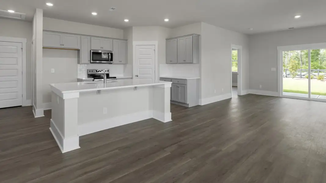 Furnished interior view inside a new home in The Retreat at Indigo Preserve Townhomes, Leland (Image 8).