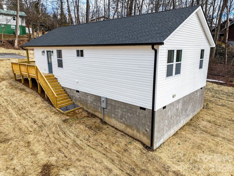 Exterior details and patio area of a home in , Black Mountain (Image 24). Exterior details and patio area of a home in , Black Mountain (Image 24).