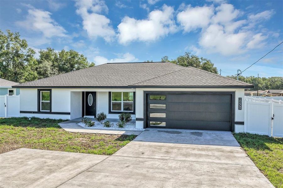 Front exterior of a new home in , Dunnellon, FL, highlighting curb appeal (Image 19). Front exterior of a new home in , Dunnellon, FL, highlighting curb appeal (Image 19).