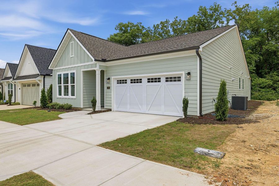 Front exterior of a new home in Social Circle, Chattanooga, TN, highlighting curb appeal (Image 2). Front exterior of a new home in Social Circle, Chattanooga, TN, highlighting curb appeal (Image 2).