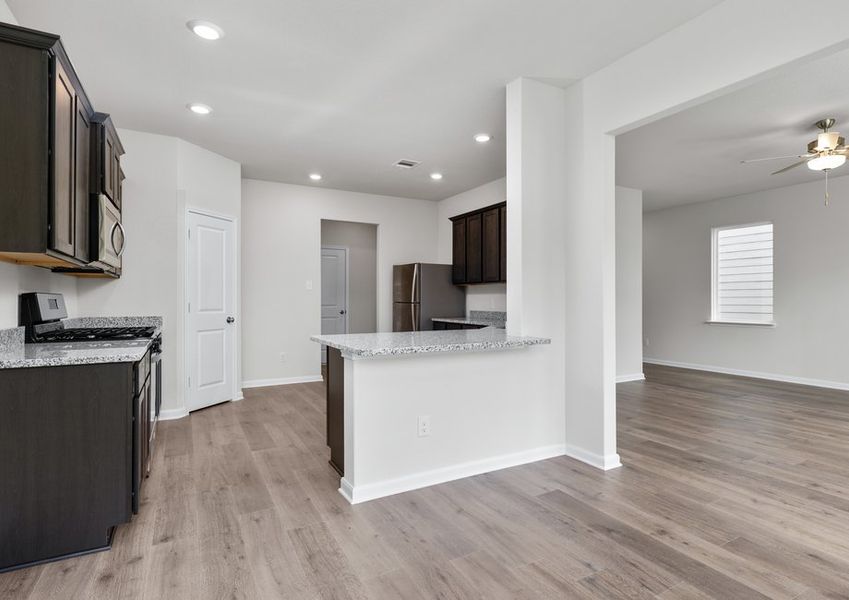 The dining room sits right off of the kitchen. The dining room sits right off of the kitchen.