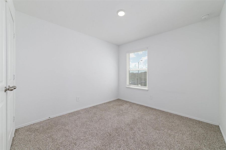 Spacious, unfurnished interior of a new home in Sunterra, Katy (Image 24).