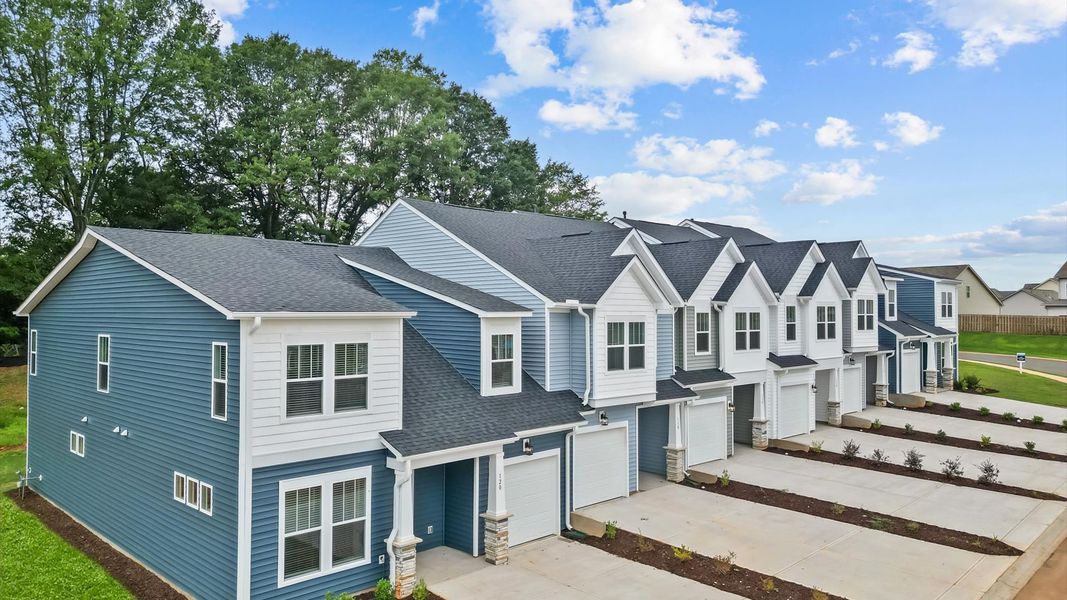 Front exterior of a new home in Aspen Ridge, Lyman, SC, highlighting curb appeal (Image 2).
