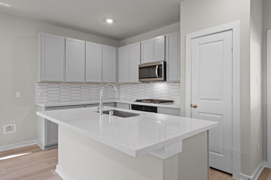 Furnished interior view inside a new home in Westridge Cove, Conroe (Image 6).