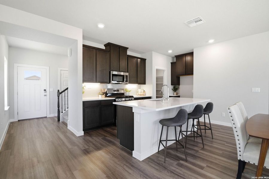 Furnished interior view inside a new home in August Fields, New Braunfels (Image 7).