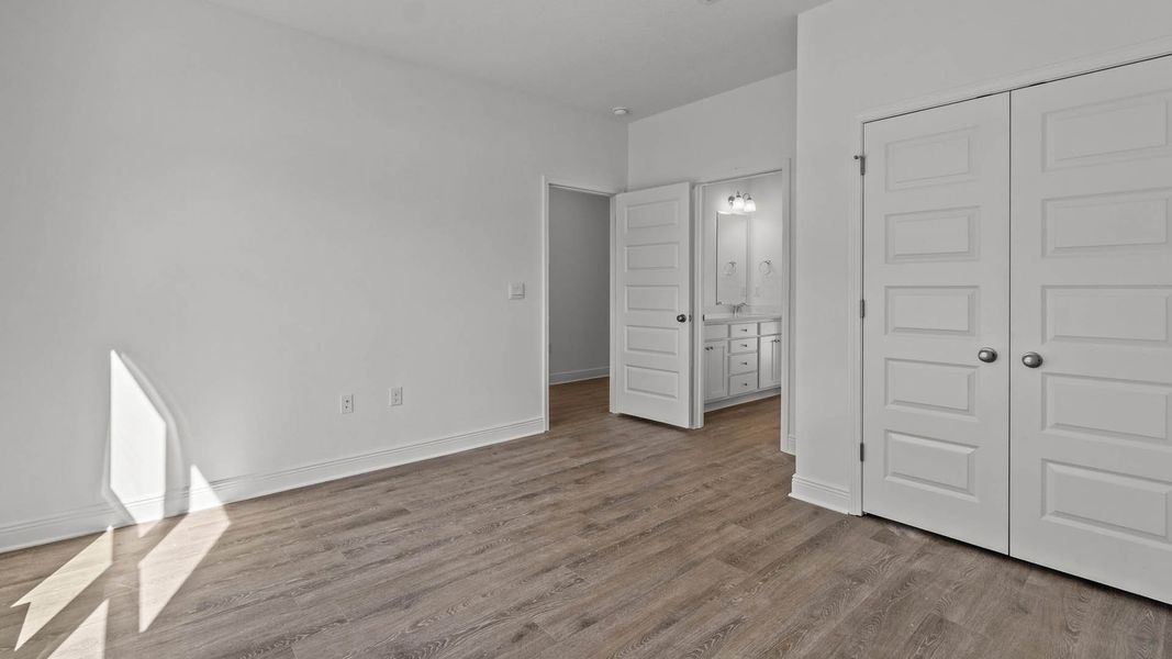 Representative unfurnished interior of a home built from the Camden by D.R. Horton in Owl's Head Farms, Freeport (Image 22).