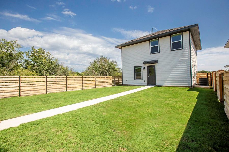 Exterior details and patio area of a home in Plum Creek North: Stonehill Collection, Kyle (Image 18).