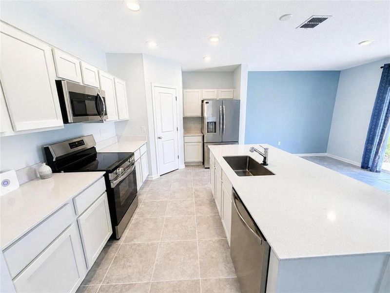 Furnished interior view inside a new home in , Kissimmee (Image 8).