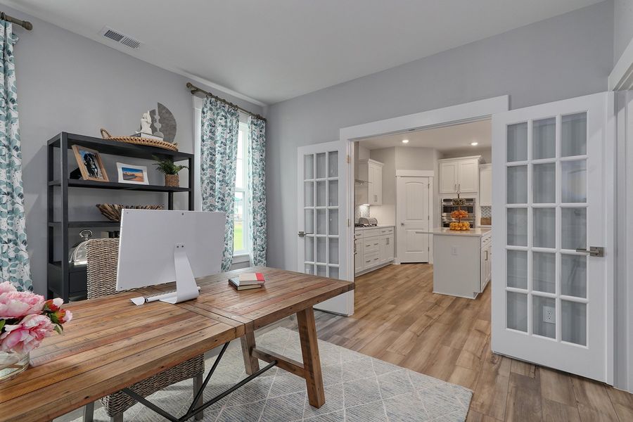 Representative furnished interior of a home built from the Warwick II - Vanguard Collection by Mungo Homes in Sweetbrier, Durham (Image 10).