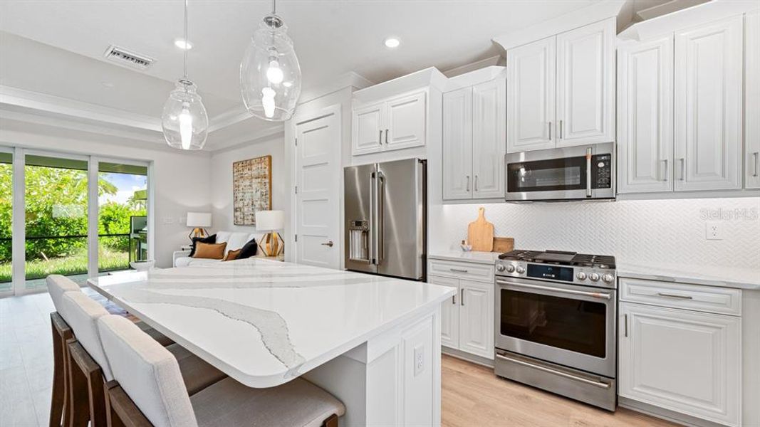Furnished interior view inside a new home in Esplanade at Azario Lakewood Ranch, Lakewood Ranch (Image 28).