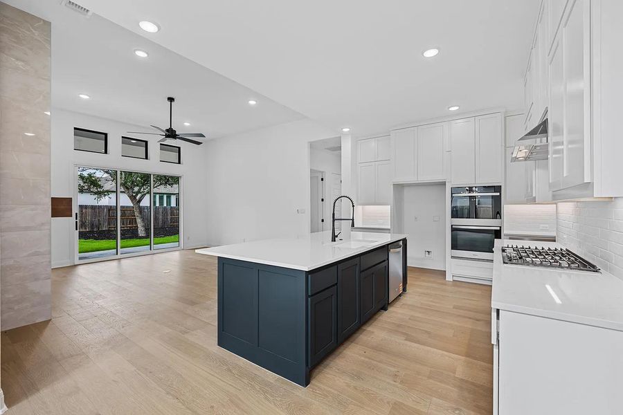 Furnished interior view inside a new home in Caliterra - 80', Dripping Springs (Image 4).