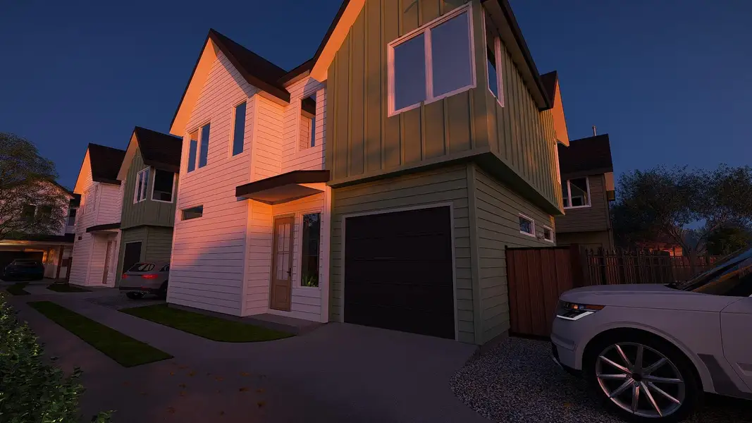 View of front facade with board and batten siding, an attached garage, and driveway