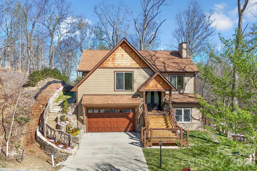 Front exterior of a new home in , Hendersonville, NC, highlighting curb appeal (Image 21).