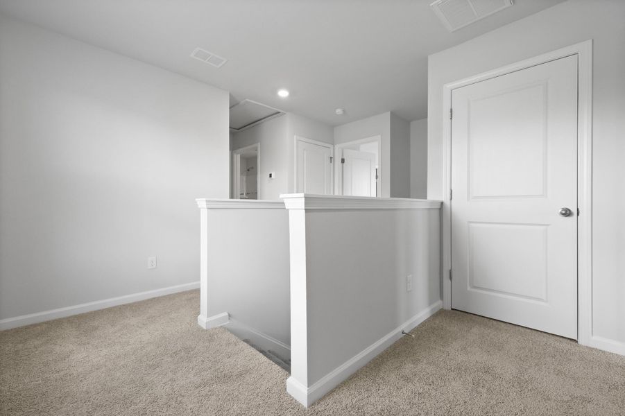 Spacious, unfurnished interior of a new home in Pine Hills at Cane Bay, Summerville (Image 23).