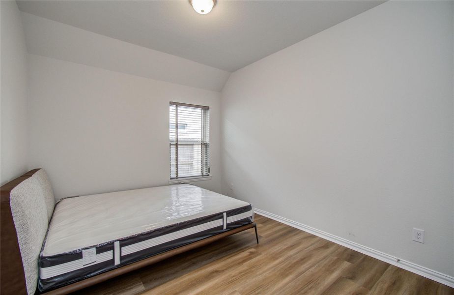 Furnished interior view inside a new home in Sunterra, Katy (Image 23).