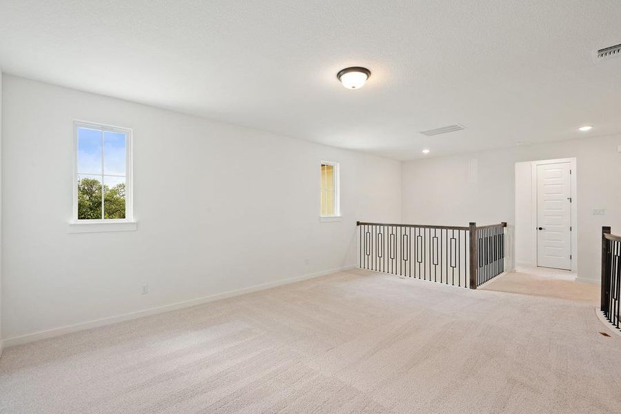 Spacious, unfurnished interior of a new home in Wolf Ranch, Georgetown (Image 37).
