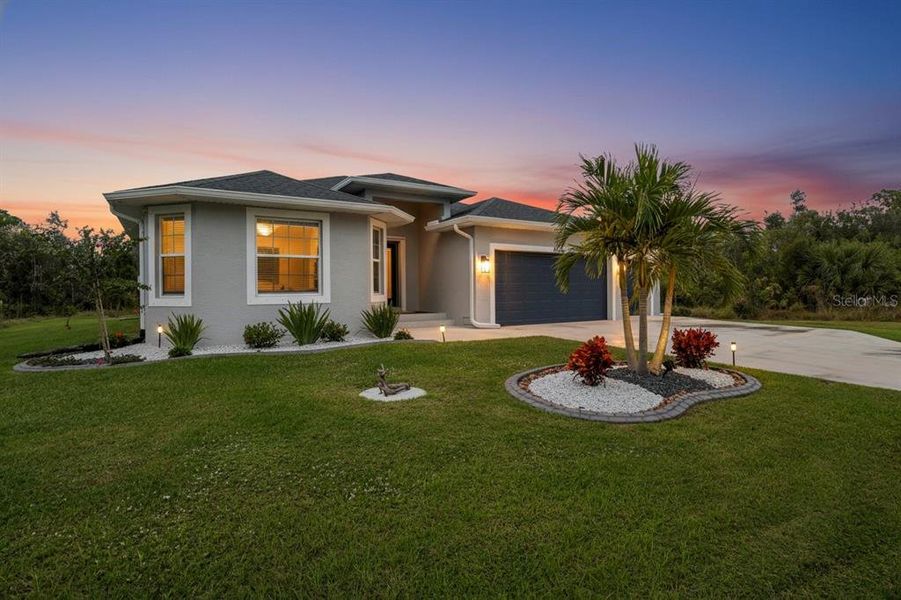 Front exterior of a new home in , Port Charlotte, FL, highlighting curb appeal (Image 2). Front exterior of a new home in , Port Charlotte, FL, highlighting curb appeal (Image 2).