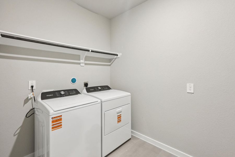 Furnished interior view inside a new home in Massey Oaks - Premier Series, Pearland (Image 6). Furnished interior view inside a new home in Massey Oaks - Premier Series, Pearland (Image 6).