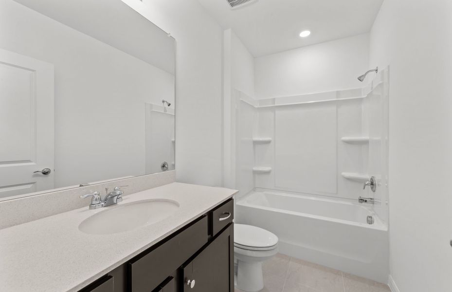 Furnished interior view inside a new home in Whispering Lakes, Lehigh Acres (Image 5).