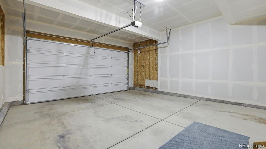 2-car attached garage with door opener.