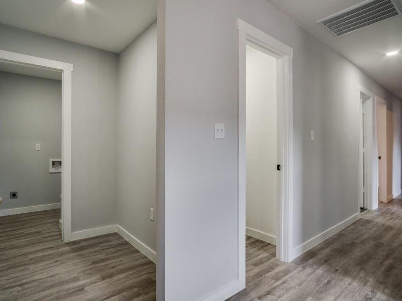 Hall featuring hardwood / wood-style floors Hall featuring hardwood / wood-style floors