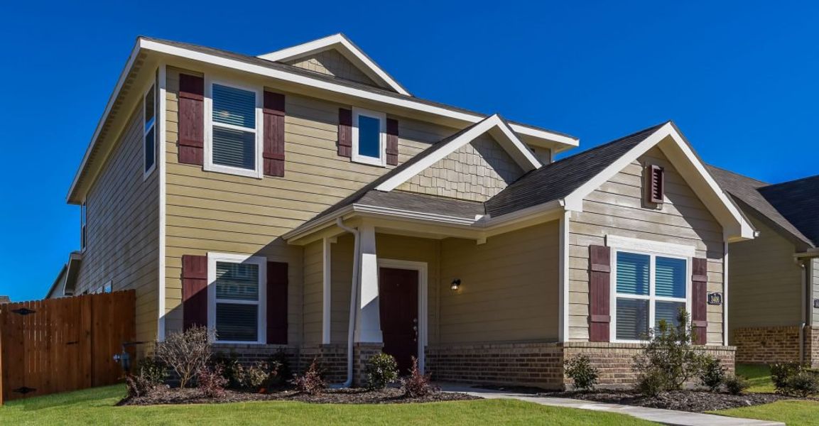 Representative exterior photo of a completed home built from the Adina by Impression Homes in Heartland, Heartland, TX (Image 2). Representative exterior photo of a completed home built from the Adina by Impression Homes in Heartland, Heartland, TX (Image 2).