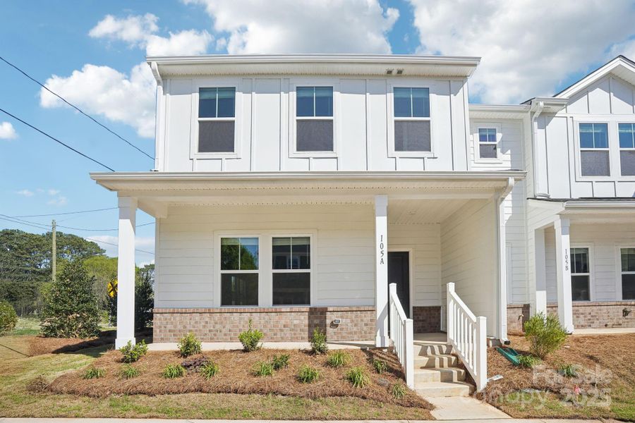 Front exterior of a new home in Crossrail Station, Mooresville, NC, highlighting curb appeal (Image 2).