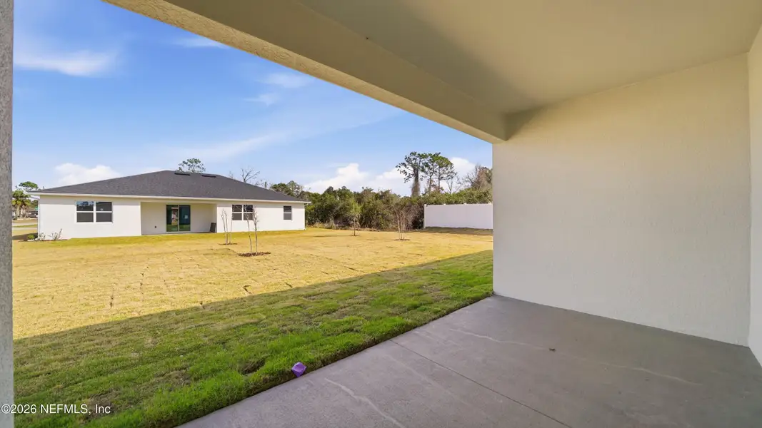 Exterior details and patio area of a home in , Palm Coast (Image 27).