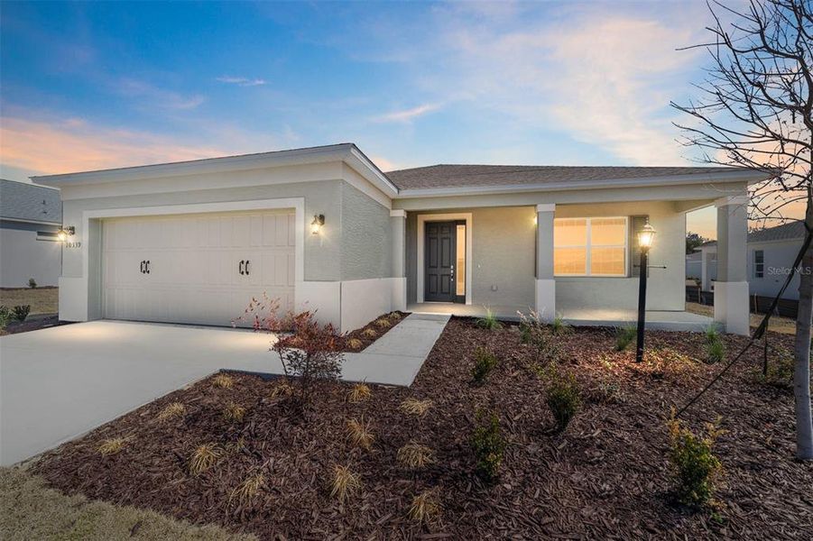 Front exterior of a new home in , Ocala, FL, highlighting curb appeal (Image 21).