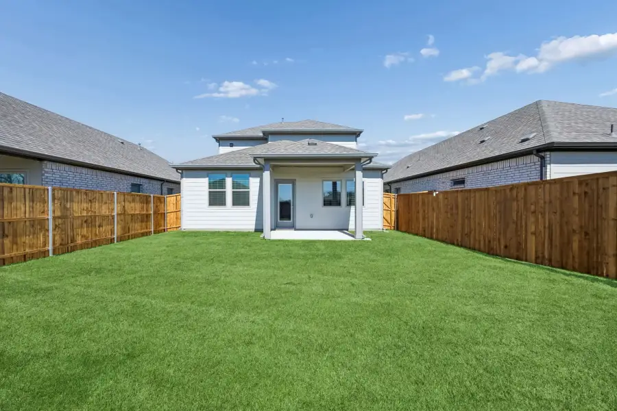 Covered Patio in the Mesquite home plan by Trophy Signature Homes – REPRESENTATIVE PHOTO Covered Patio in the Mesquite home plan by Trophy Signature Homes – REPRESENTATIVE PHOTO