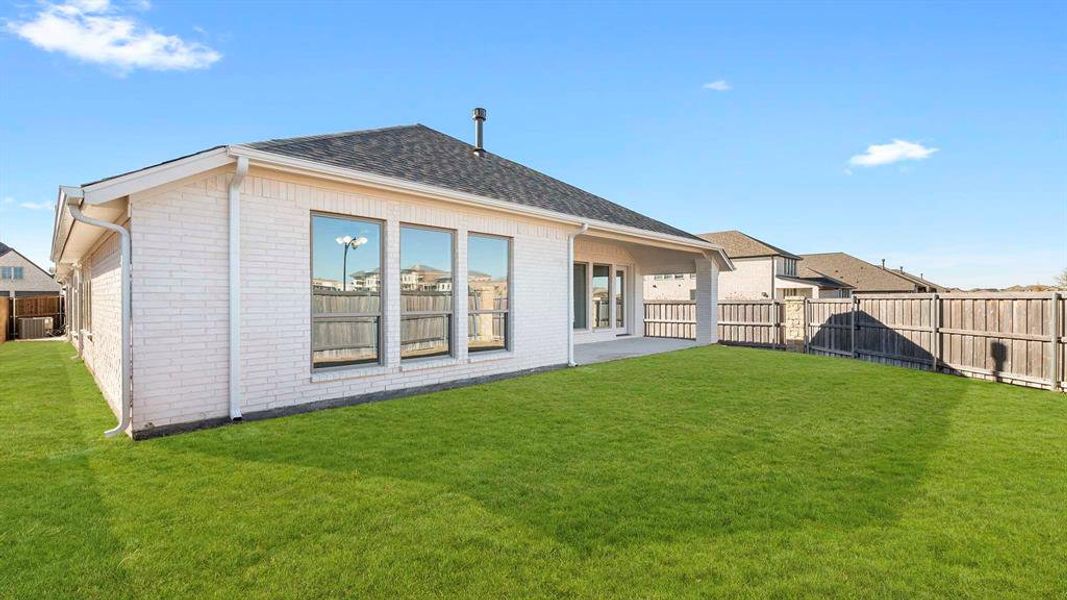 Exterior details and patio area of a home in Devonshire - Reserve 50', Forney (Image 3).
