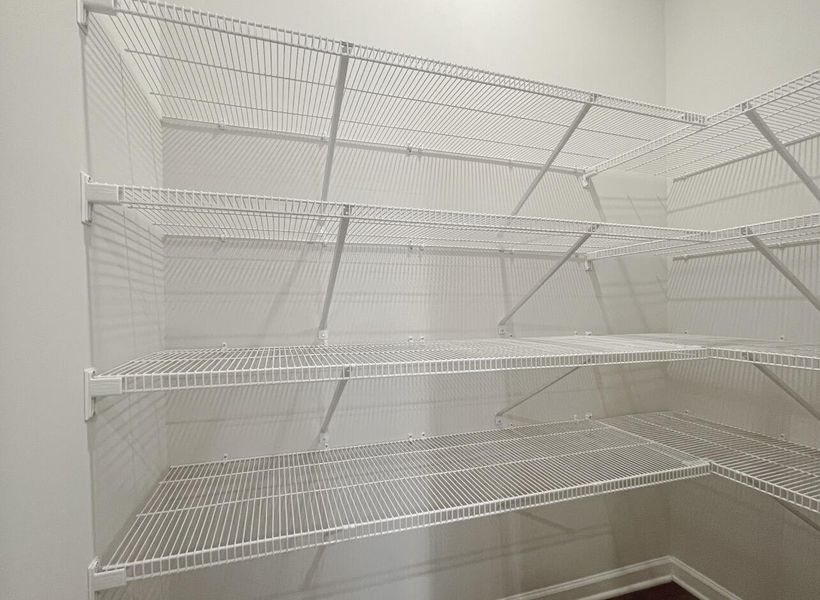 Spacious, unfurnished interior of a new home in East Main Townes, Spartanburg (Image 14).