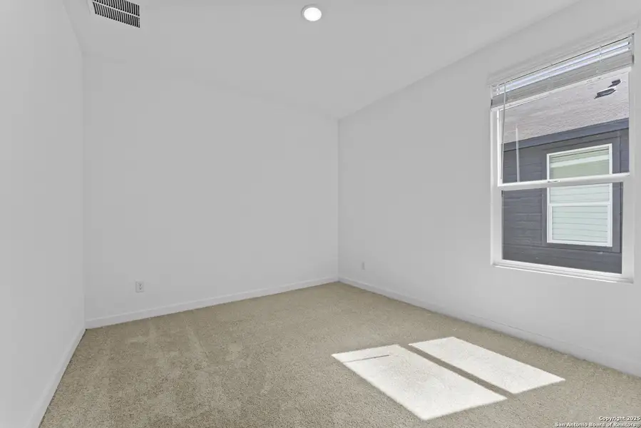 Spacious, unfurnished interior of a new home in Waterwheel: Coastline Collection, San Antonio (Image 11).