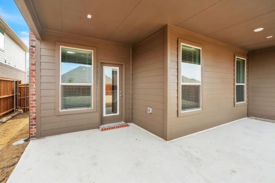 Exterior details and patio area of a home in The Landing at Hidden Lakes, McKinney (Image 4).