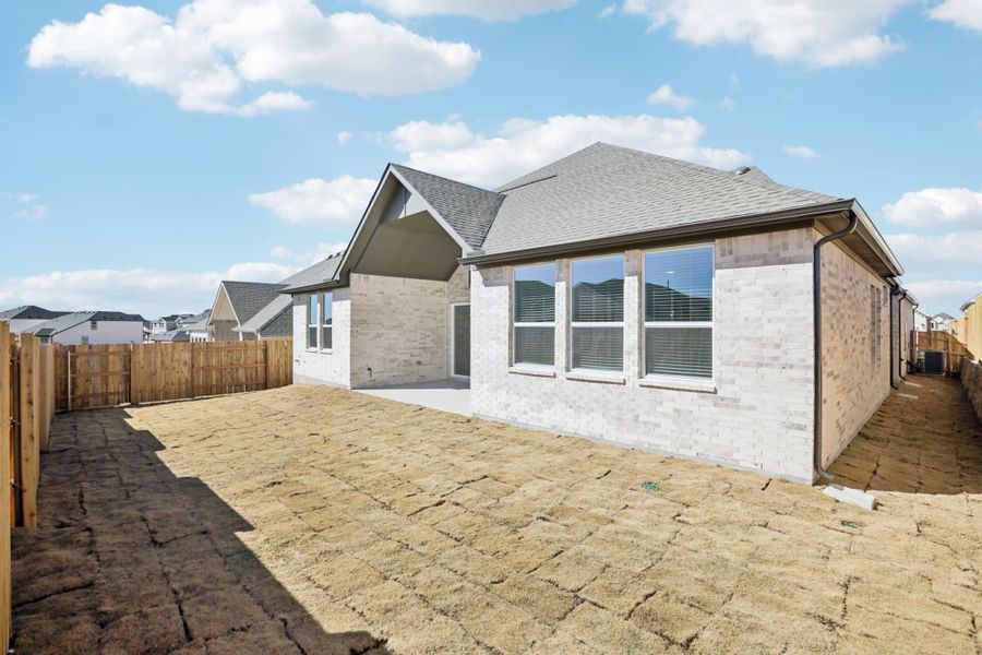 Exterior details and patio area of a home in Sunfield, Buda (Image 20).