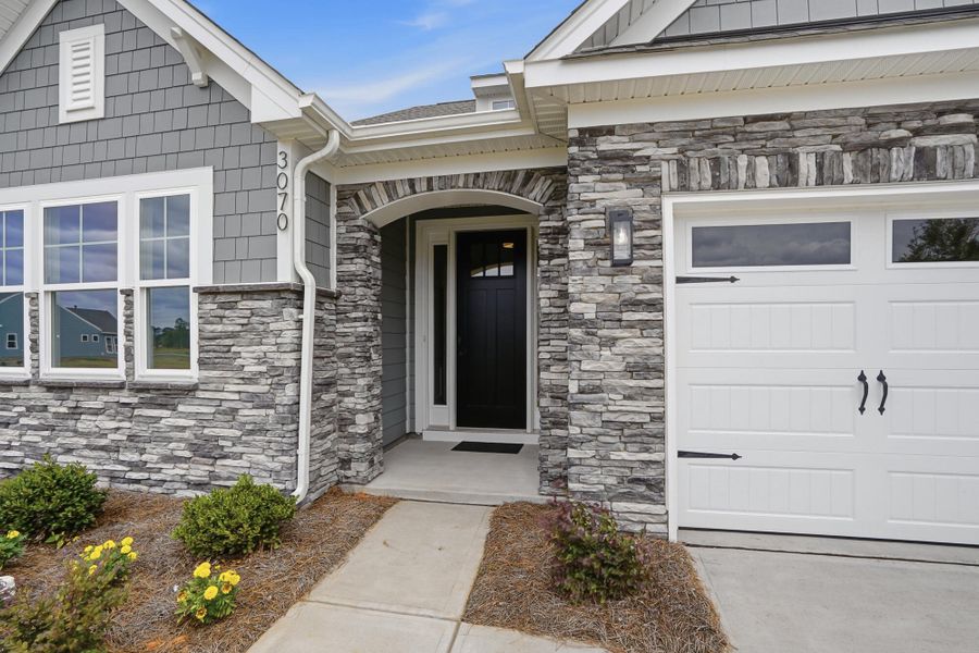 Exterior details and patio area of a home in Founders Landing | 55+ Community, Gastonia (Image 2).