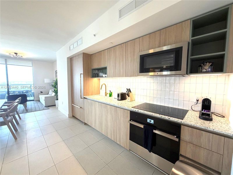 Furnished interior view inside a new home in , Miami (Image 9).