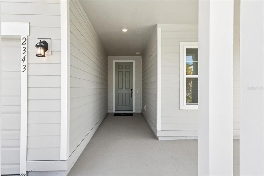 Exterior details and patio area of a home in Ellington Traditional, St. Cloud (Image 22). Exterior details and patio area of a home in Ellington Traditional, St. Cloud (Image 22).