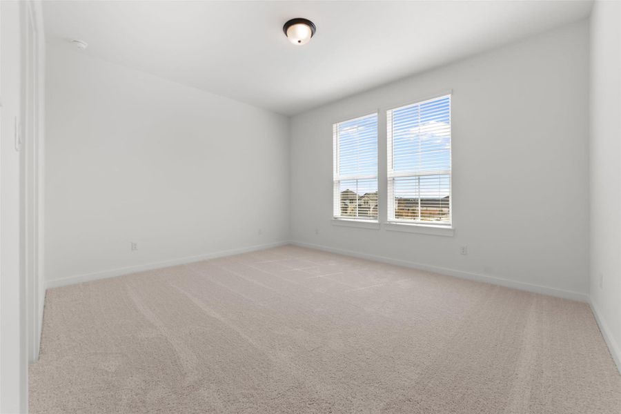 Spacious, unfurnished interior of a new home in Heritage, Dripping Springs (Image 13).
