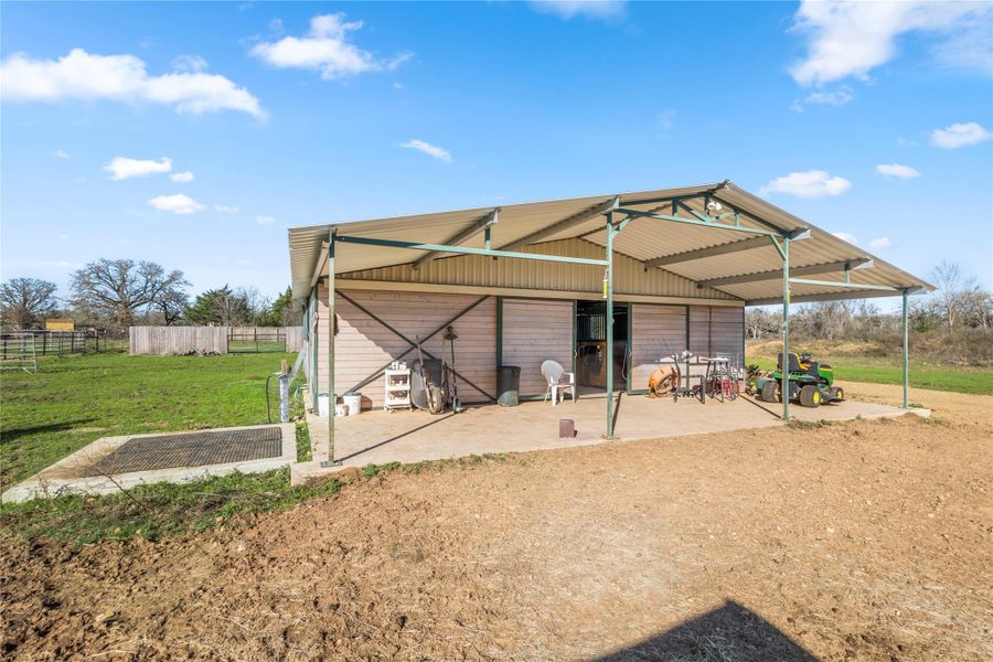 30x60 Castlebrook Gable Style Barn.Covered Concrete and wash area, 5 Stalls and 3 with Exterior Doors.