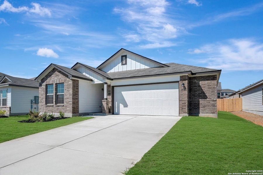 Front exterior of a new home in Greenspoint Heights, Seguin, TX, highlighting curb appeal (Image 1). Front exterior of a new home in Greenspoint Heights, Seguin, TX, highlighting curb appeal (Image 1).