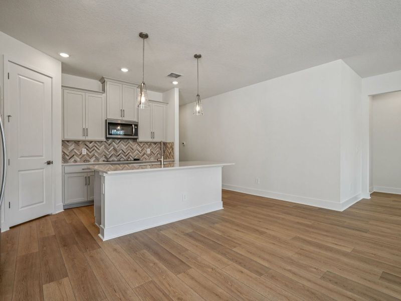 Furnished interior view inside a new home in Ridgehaven - Signature Series, Ormond Beach (Image 4).