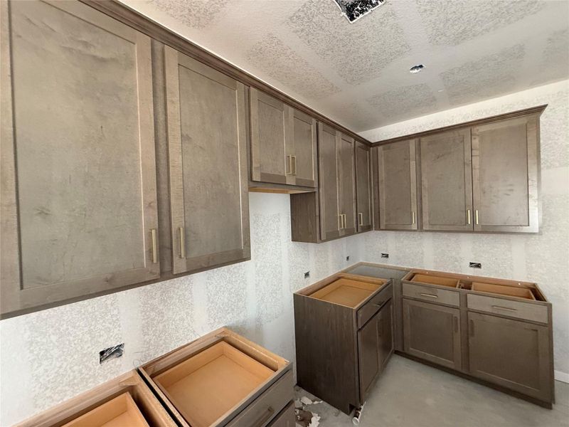 In-progress construction of a new home in The Cottages at La Cima, San Marcos, TX (Image 22).