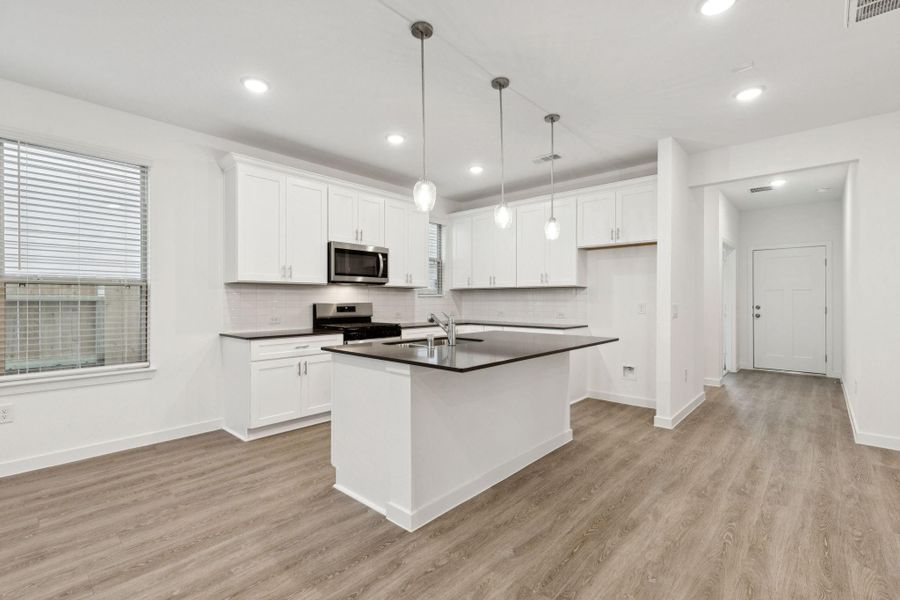 Furnished interior view inside a new home in Mavera, Conroe (Image 8).